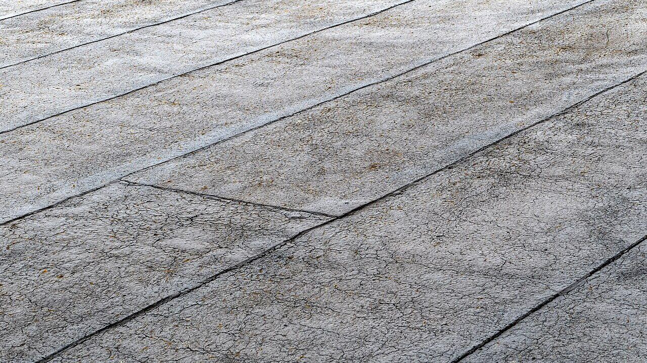Concrete terrace roof surface prepared and treated as part of waterproofing work.